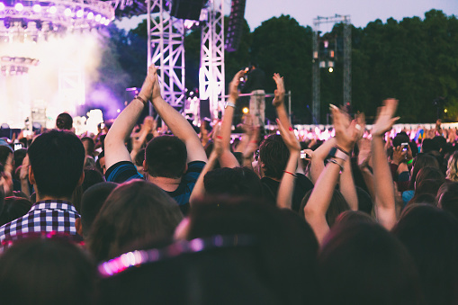 High energy, high volume outdoor concert.